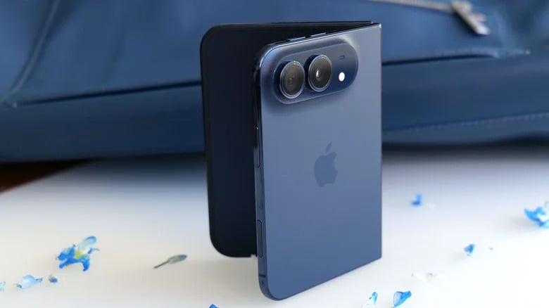 Smartphone in blue displayed at angle showing dual camera lens on back