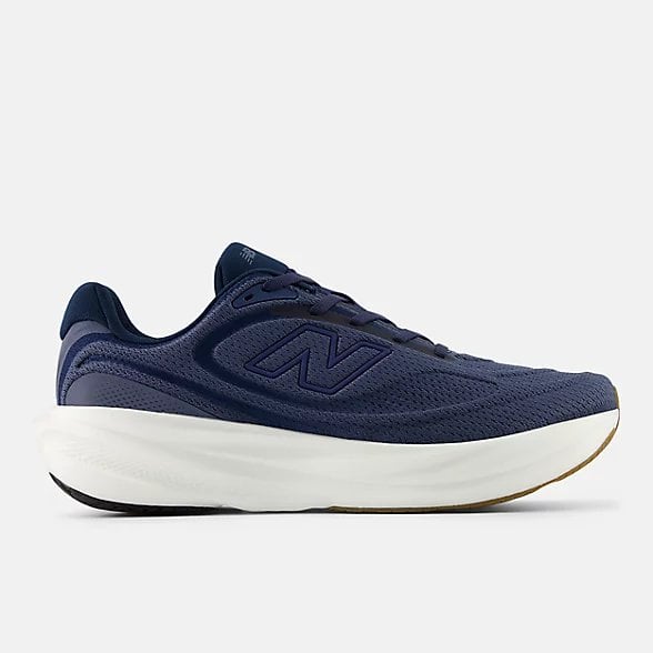 Navy blue mesh running shoe with white cushioned midsole, side view