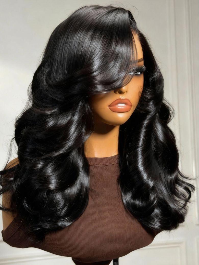 Mannequin head displaying long black wavy wig with deep side part and glossy finish